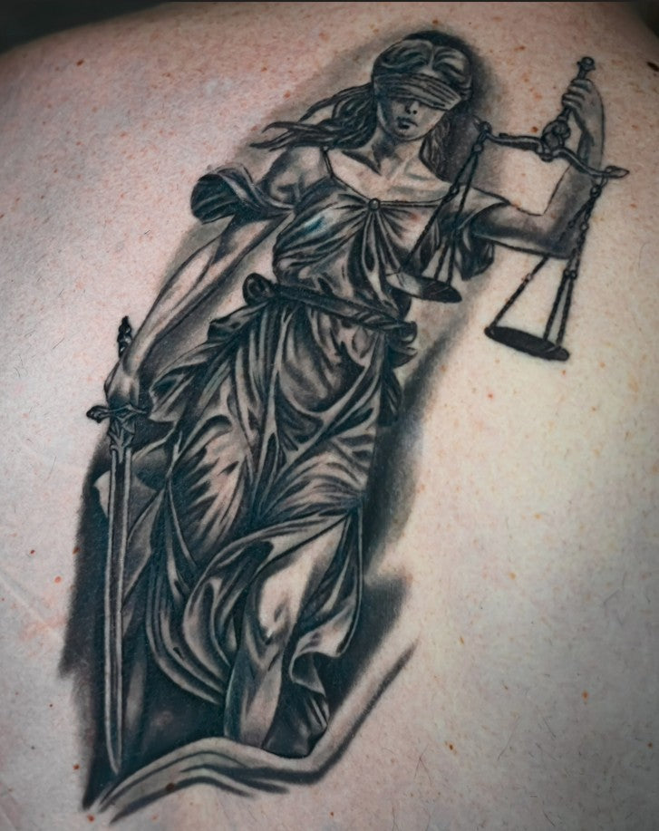 Healed realistic lady justice tattoo